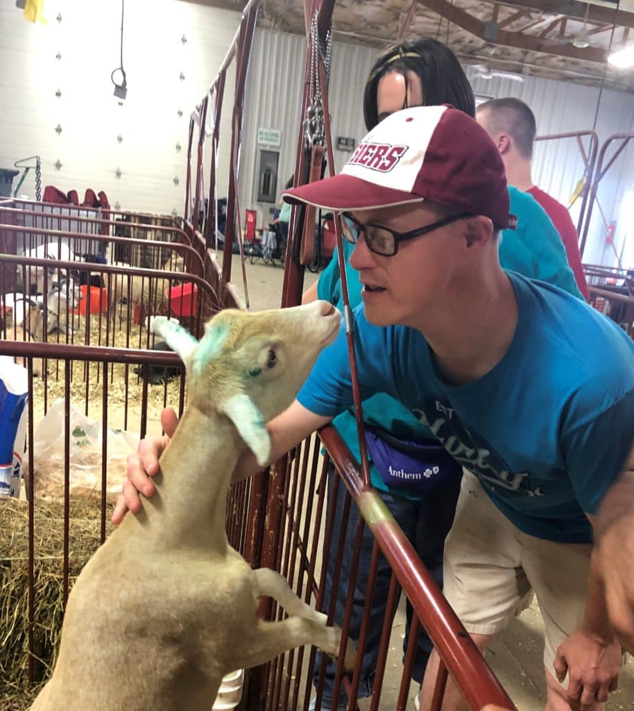 Shares, Inc. zoo trip, goat petting